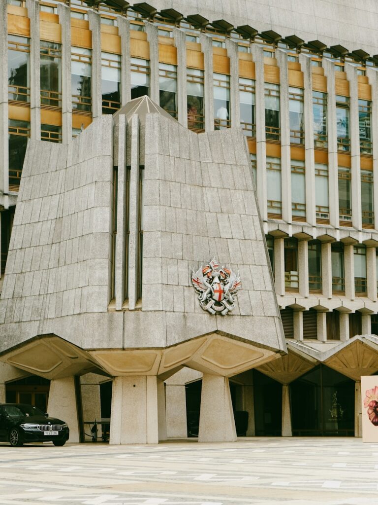 a large building with a clock on the side of it